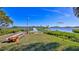 Wooden dock extending to the water, offering a peaceful view at 417 N Riverside Dr, Edgewater, FL 32132