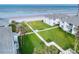 View of condo building, walkway to beach, ocean view at 4225 S Atlantic Ave # 144, New Smyrna Beach, FL 32169