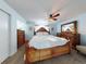 Spacious bedroom with large bed and ample dresser space at 4225 S Atlantic Ave # 144, New Smyrna Beach, FL 32169