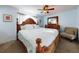 Bright bedroom featuring a king-size bed and calming decor at 4225 S Atlantic Ave # 144, New Smyrna Beach, FL 32169