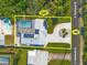 Aerial view showing home, pool, and driveway at 4367 S Peninsula Dr, Ponce Inlet, FL 32127