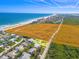 Aerial view showing home's location near beach and conservation at 4367 S Peninsula Dr, Ponce Inlet, FL 32127