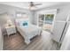 Bedroom with white dresser and pool view at 4367 S Peninsula Dr, Ponce Inlet, FL 32127