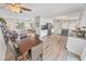 Kitchen and dining area with light wood floors and modern decor at 4367 S Peninsula Dr, Ponce Inlet, FL 32127