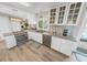 Updated kitchen featuring granite countertops and white cabinetry at 4367 S Peninsula Dr, Ponce Inlet, FL 32127