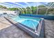 Inviting screened pool with ample patio space at 4367 S Peninsula Dr, Ponce Inlet, FL 32127