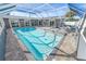 Inviting screened pool area with patio furniture at 4367 S Peninsula Dr, Ponce Inlet, FL 32127