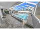 Inviting screened pool area with spacious patio at 4367 S Peninsula Dr, Ponce Inlet, FL 32127