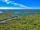 Expansive aerial view of lush mangroves and waterways at 4514 Saxon Dr, New Smyrna Beach, FL 32169