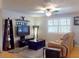 Bright living room featuring hardwood floors and comfortable seating at 4514 Saxon Dr, New Smyrna Beach, FL 32169