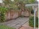 Sidewalk with pavers and wooden fence at 4514 Saxon Dr, New Smyrna Beach, FL 32169