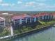 Attractive building with red tile roofs near the water at 460 Bouchelle Dr # 304, New Smyrna Beach, FL 32169