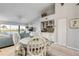 Dining area with view of wet bar and living room at 460 Bouchelle Dr # 304, New Smyrna Beach, FL 32169