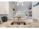 Kitchen with granite countertops and stainless steel sink at 460 Bouchelle Dr # 304, New Smyrna Beach, FL 32169