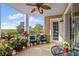 Spacious balcony with comfortable seating and lush potted plants offers relaxing outdoor space at 4628 Harbour Village Blvd # 2206, Ponce Inlet, FL 32127