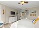 Main bedroom with white dresser and view of the bathroom at 4628 Harbour Village Blvd # 2206, Ponce Inlet, FL 32127