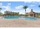 Resort-style pool with a relaxing gazebo and plenty of lounge chairs at 4628 Harbour Village Blvd # 2206, Ponce Inlet, FL 32127