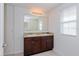 Double sink vanity and large mirror in bathroom at 4825 Apple Blossom Ln, Saint Cloud, FL 34771