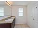 Double sink vanity with large mirror in bathroom at 4825 Apple Blossom Ln, Saint Cloud, FL 34771