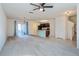 Spacious living room with access to patio and kitchen at 4825 Apple Blossom Ln, Saint Cloud, FL 34771