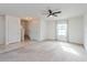 Bright and airy living room with carpeted floors at 4825 Apple Blossom Ln, Saint Cloud, FL 34771