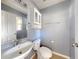 Clean bathroom with white vanity and fixtures at 526 Mount Olympus Blvd, New Smyrna Beach, FL 32168