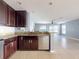 Kitchen boasts stainless steel appliances and granite countertops at 526 Mount Olympus Blvd, New Smyrna Beach, FL 32168