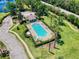 Inviting community pool with surrounding landscaping at 526 Mount Olympus Blvd, New Smyrna Beach, FL 32168