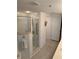 Clean bathroom with shower, tub and double sinks at 5300 S Atlantic Ave # 16201, New Smyrna Beach, FL 32169