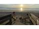 Wooden stairs leading down to the beach at 5300 S Atlantic Ave # 16201, New Smyrna Beach, FL 32169