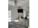 Main bedroom with a king-size bed and private balcony access at 5300 S Atlantic Ave # 16201, New Smyrna Beach, FL 32169