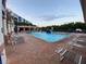 Relaxing community pool with plenty of lounge chairs at 5300 S Atlantic Ave # 16201, New Smyrna Beach, FL 32169