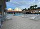 Community pool area with numerous lounge chairs at 5300 S Atlantic Ave # 16201, New Smyrna Beach, FL 32169