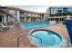 Relaxing community pool and spa area with lounge chairs at 5300 S Atlantic Ave # 16201, New Smyrna Beach, FL 32169