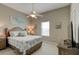 Comfortable bedroom with a king-size bed and coastal decor at 6612 S Atlantic Ave # 2010, New Smyrna Beach, FL 32169