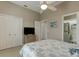 Bedroom with king-size bed, built-in closet and en-suite bathroom at 6612 S Atlantic Ave # 201, New Smyrna Beach, FL 32169