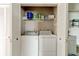 Laundry closet with washer and dryer at 6612 S Atlantic Ave # 201, New Smyrna Beach, FL 32169