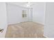 Bright bedroom with neutral walls and plush carpeting at 6932 Vintage Ln, Port Orange, FL 32128