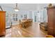 Dining room with hardwood floor and view to the living room at 6932 Vintage Ln, Port Orange, FL 32128