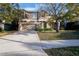 Two-story house with a driveway and attached garage at 6932 Vintage Ln, Port Orange, FL 32128
