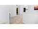 Upstairs hallway with light blue walls and carpet at 6932 Vintage Ln, Port Orange, FL 32128