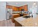 Spacious kitchen with stainless steel appliances and granite countertops at 6932 Vintage Ln, Port Orange, FL 32128