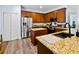 Spacious kitchen with stainless steel appliances and granite countertops at 6932 Vintage Ln, Port Orange, FL 32128