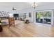 Bright living room with sliding doors leading to a pool at 6932 Vintage Ln, Port Orange, FL 32128