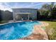 Stunning pool with surrounding patio and home at 6932 Vintage Ln, Port Orange, FL 32128