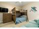 Bunk bed in a bedroom with plenty of space for to play at 701 N Atlantic Ave # 102, New Smyrna Beach, FL 32169