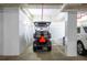 Grey golf cart in garage at 701 N Atlantic Ave # 102, New Smyrna Beach, FL 32169