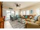 Living room with comfy seating and ocean views at 701 N Atlantic Ave # 102, New Smyrna Beach, FL 32169