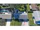 House with gray roof and a paved driveway, next to other houses at 752 Tarry Town Trl, Port Orange, FL 32127