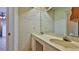 Bright bathroom with double vanity and large mirror at 752 Tarry Town Trl, Port Orange, FL 32127